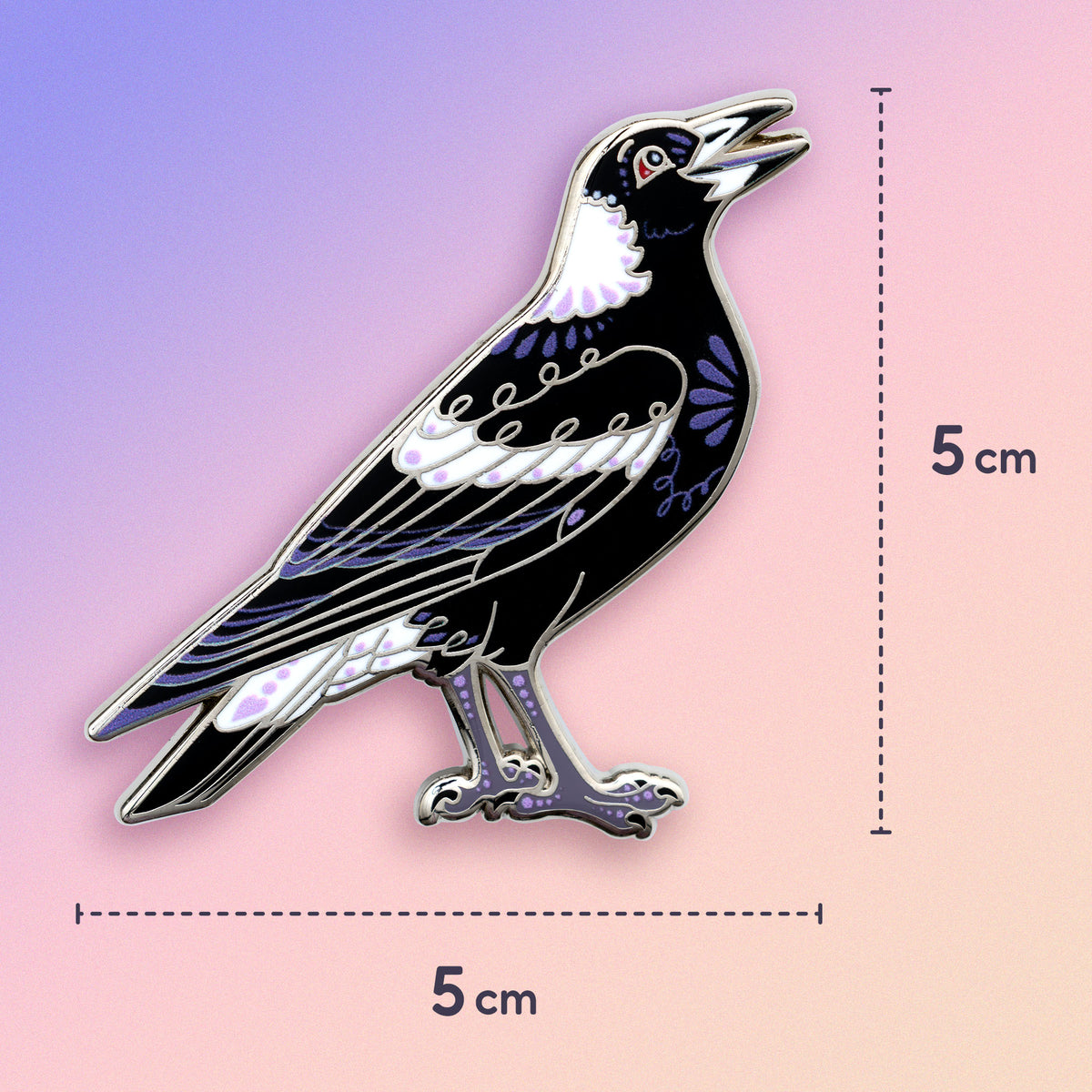 5x5cm nickel-plated Australian magpie hard enamel pin on a blue, purple and pink gradient background.
