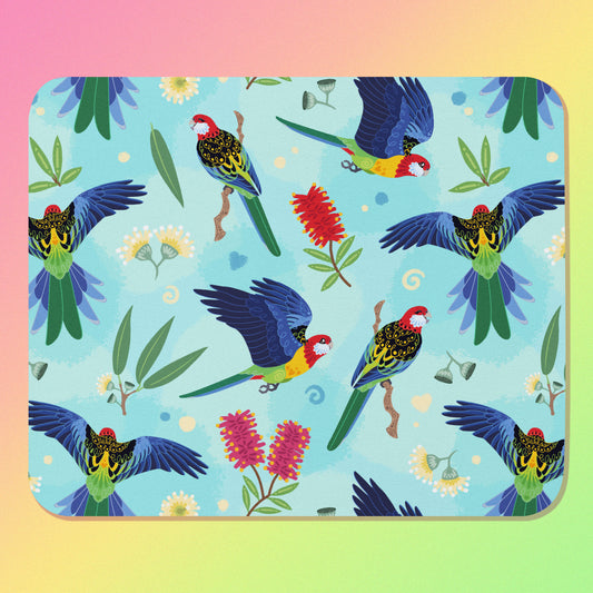 Mouse pad with an eastern rosella parrot design on a gradient background