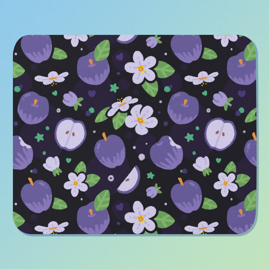 Mouse pad with purple fruit and flower pattern on a blue and green gradient background