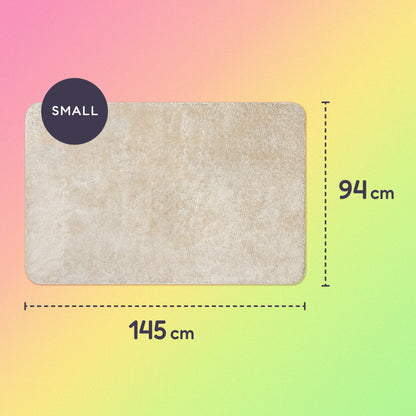 145 x 94cm small sherpa blanket on a pink, yellow and green gradient background.