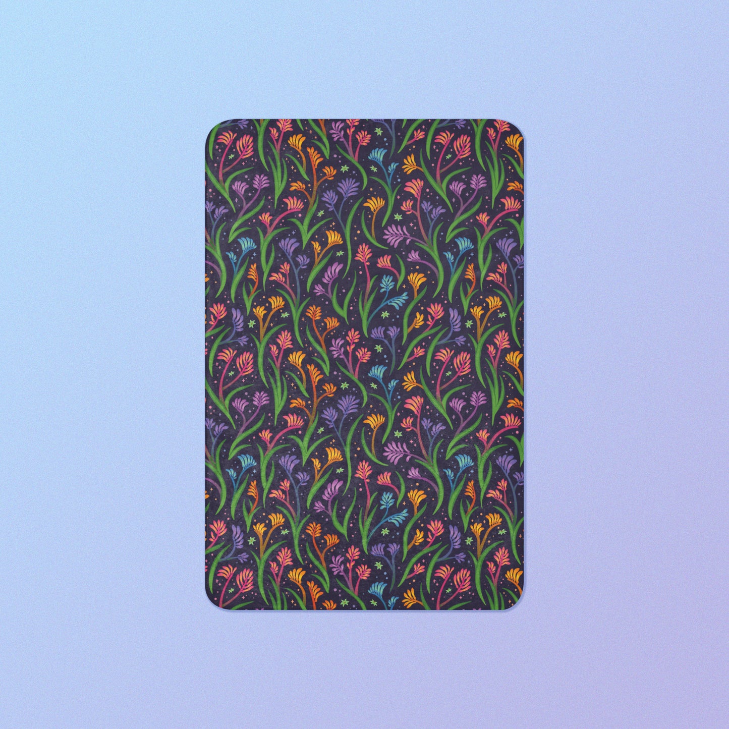 A rainbow kangaroo paw flower pattern blanket on a blue and purple gradient background.