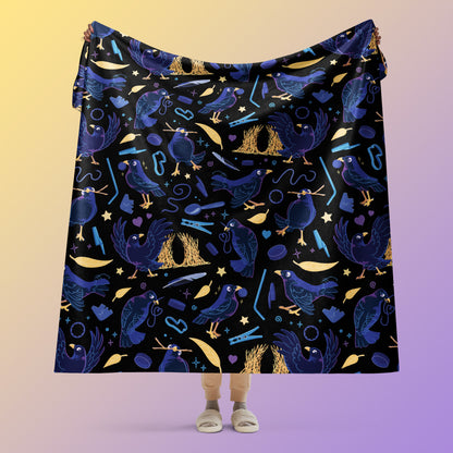 Person holding a black, blue, purple and yellow male Aussie satin bowerbird pattern blanket above their head on a yellow and purple gradient background.