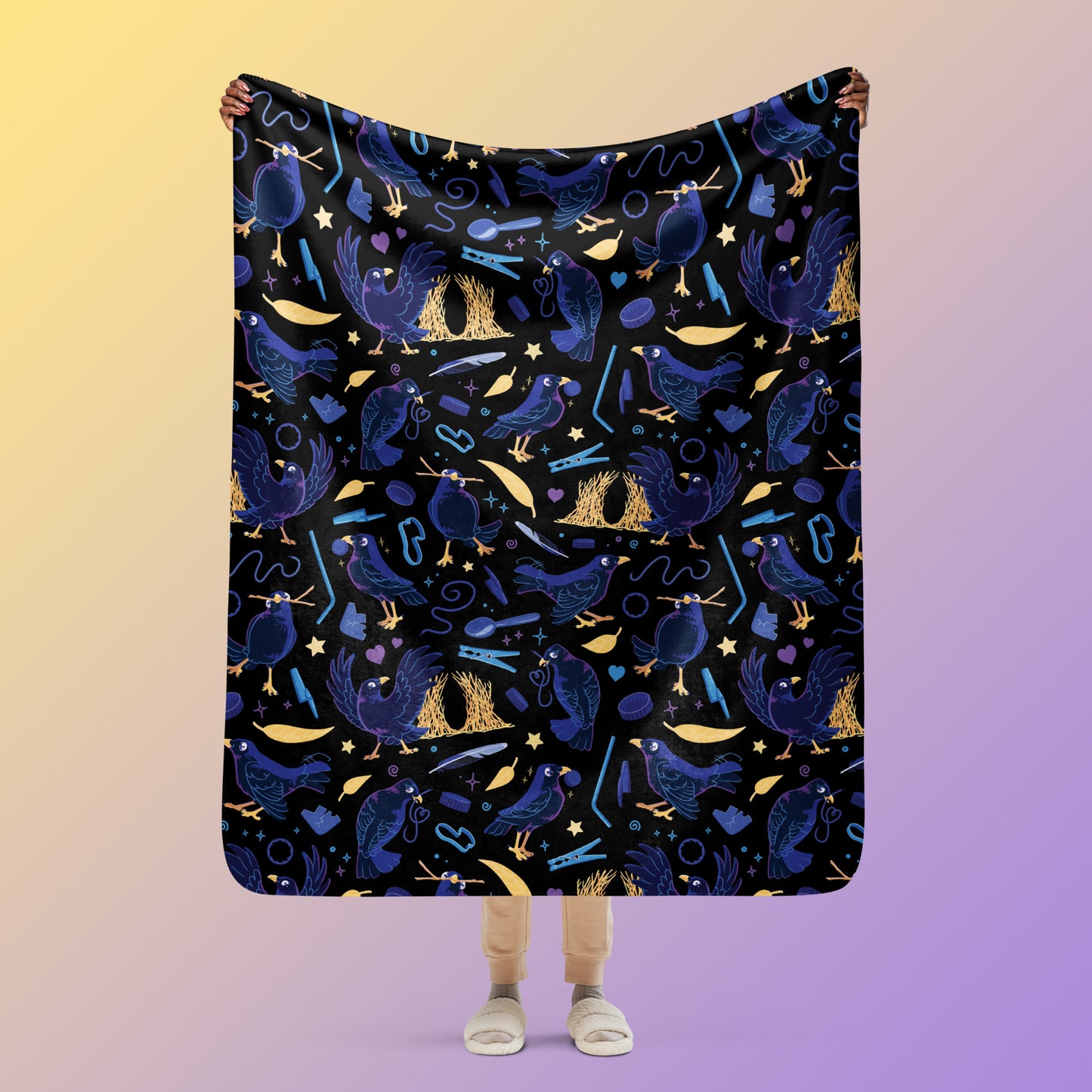 Person holding a black, blue, purple and yellow male Aussie satin bowerbird pattern blanket above their head on a yellow and purple gradient background.