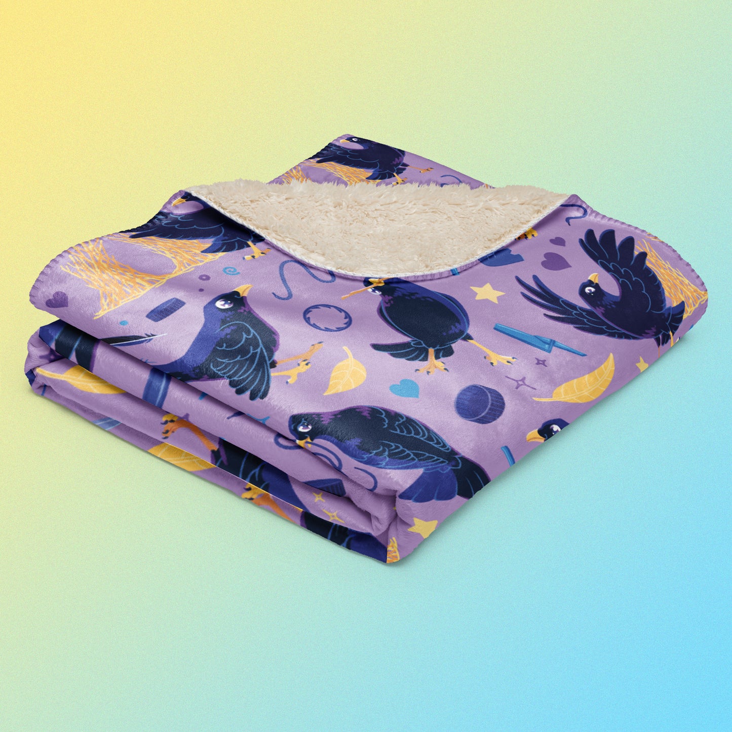 A folded purple, blue and yellow male Aussie satin bowerbird pattern blanket on a yellow and blue gradient background.