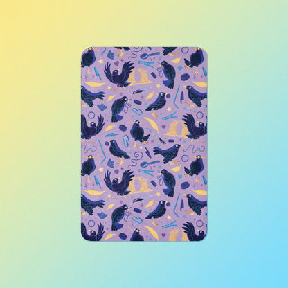 A purple, blue and yellow male Aussie satin bowerbird pattern blanket on a yellow and blue gradient background.