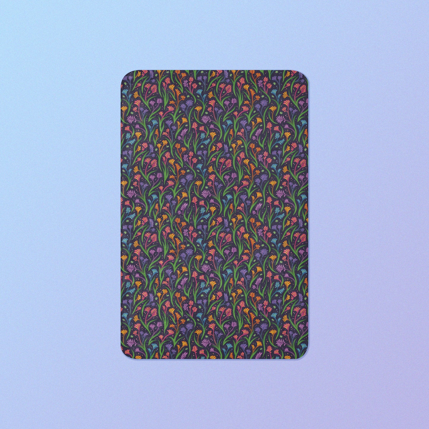 A rainbow kangaroo paw flower pattern blanket on a blue and purple gradient background.