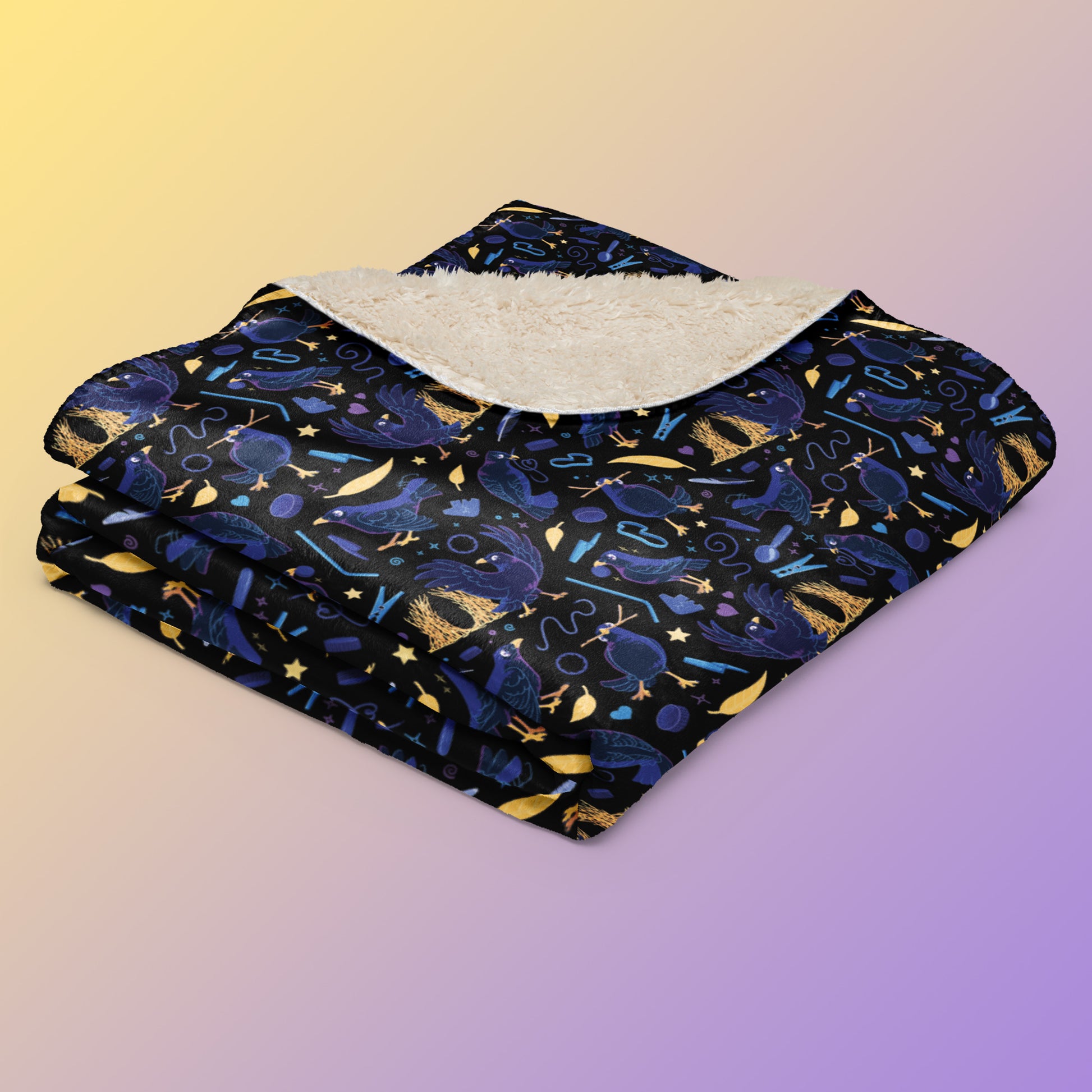 A folded black, blue, purple and yellow male Aussie satin bowerbird pattern blanket on a yellow and purple gradient background.