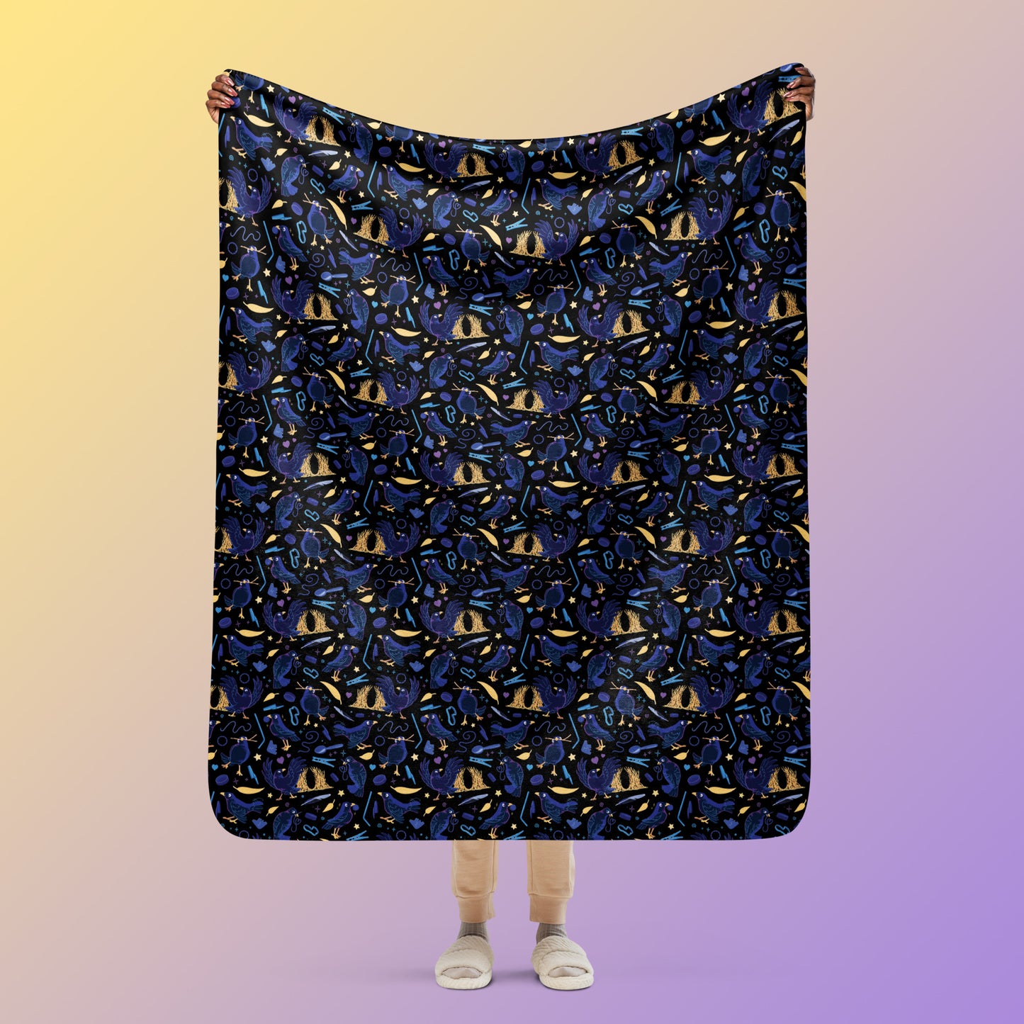 Person holding a black, blue, purple and yellow male Aussie satin bowerbird pattern blanket above their head on a yellow and purple gradient background.