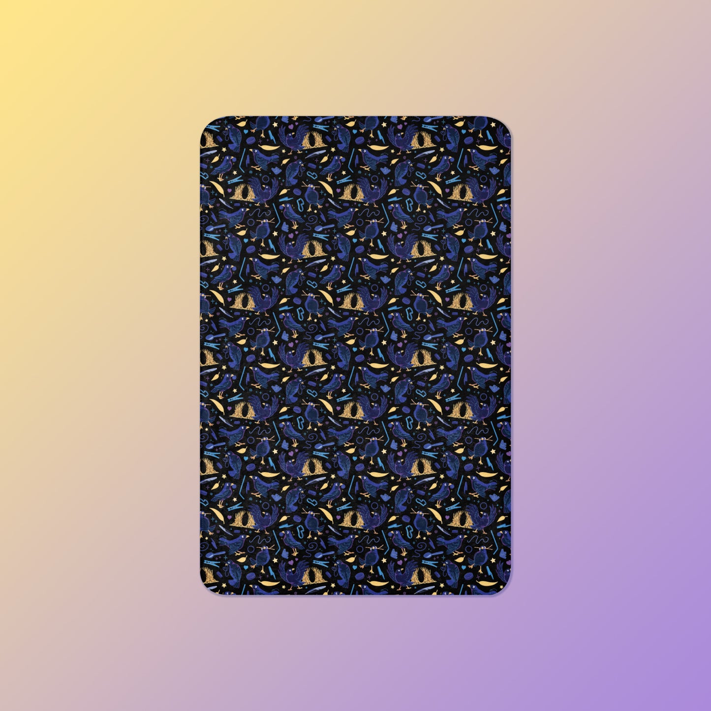 A black, blue, purple and yellow male Aussie satin bowerbird pattern blanket on a yellow and purple gradient background.