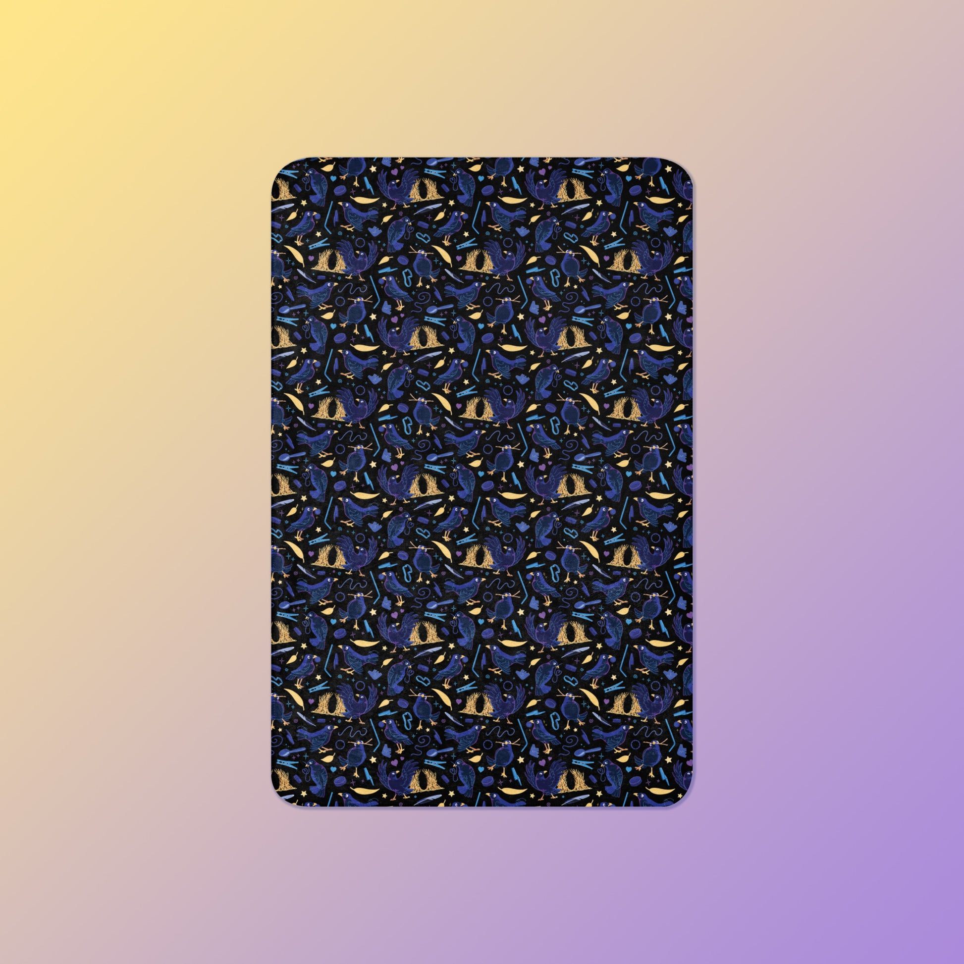A black, blue, purple and yellow male Aussie satin bowerbird pattern blanket on a yellow and purple gradient background.