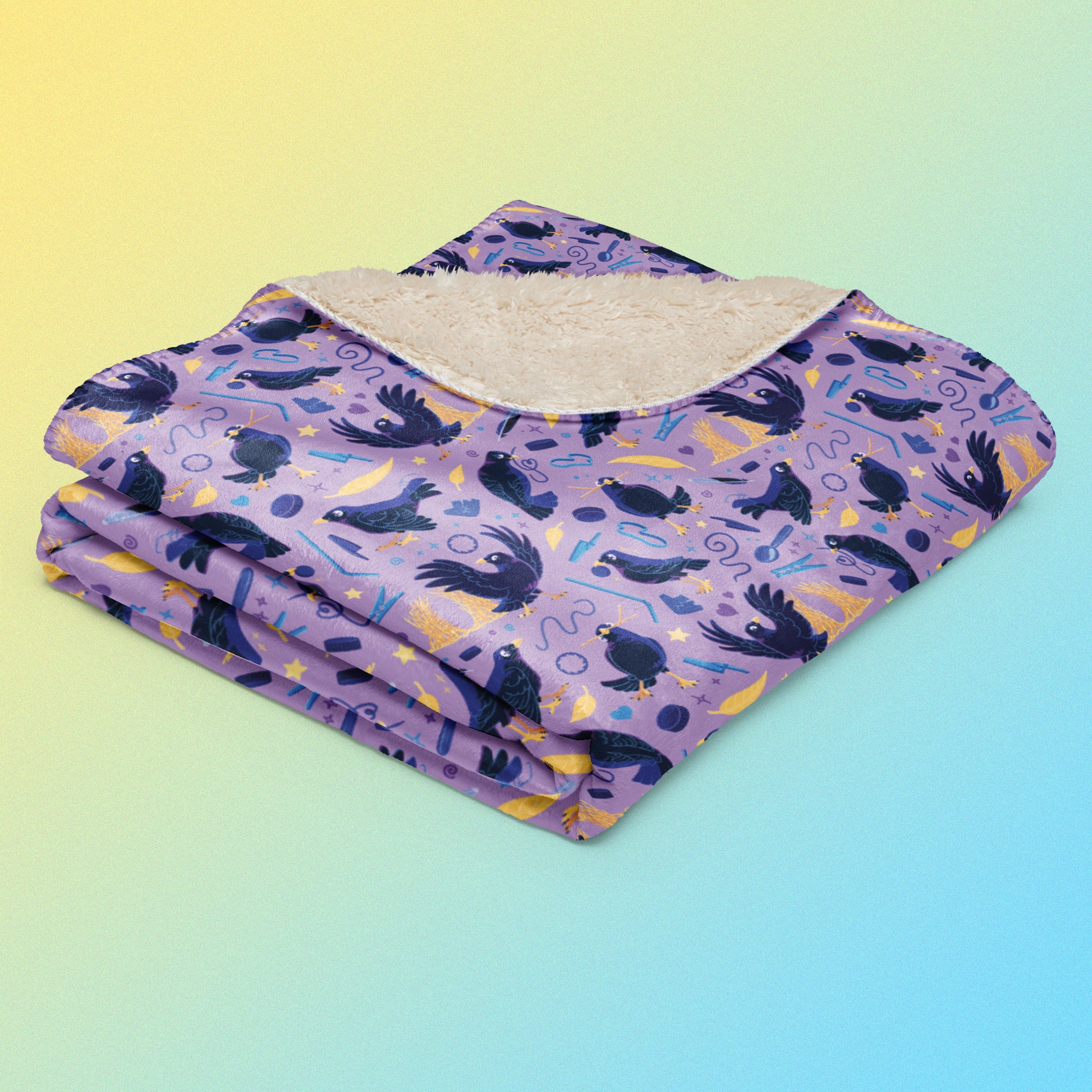 A folded purple, blue and yellow male Aussie satin bowerbird pattern blanket on a yellow and blue gradient background.