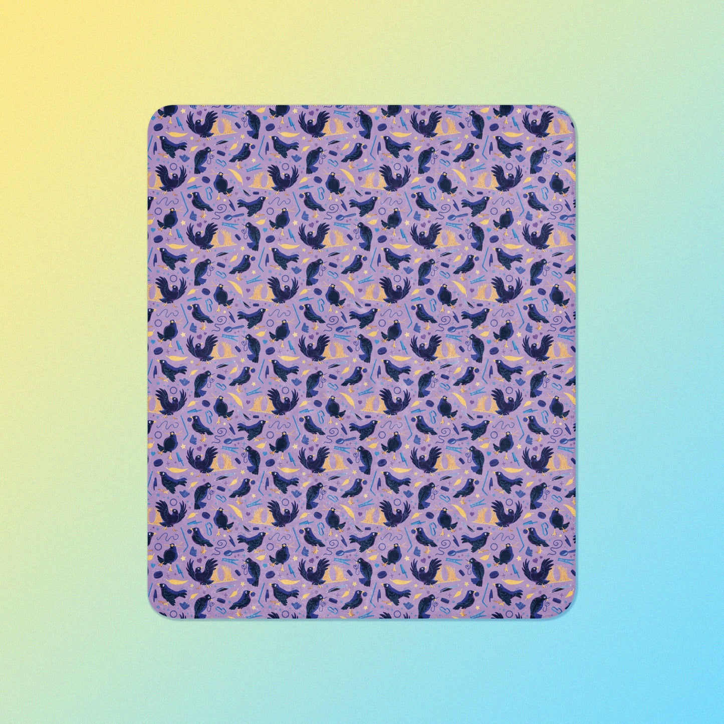 A purple, blue and yellow male Aussie satin bowerbird pattern blanket on a yellow and blue gradient background.