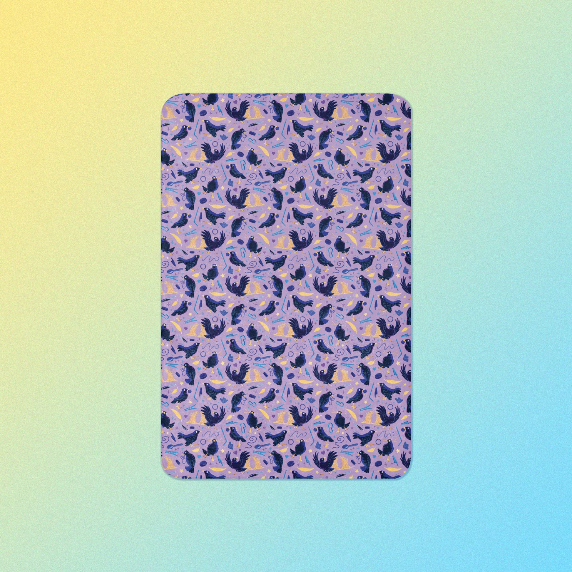 A purple, blue and yellow male Aussie satin bowerbird pattern blanket on a yellow and blue gradient background.