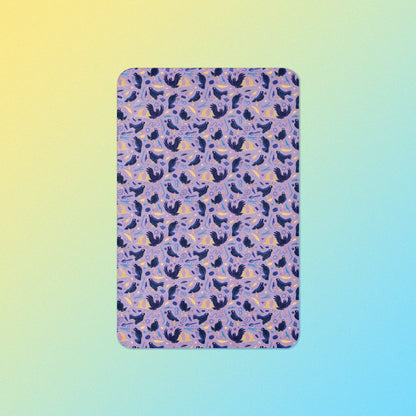 A purple, blue and yellow male Aussie satin bowerbird pattern blanket on a yellow and blue gradient background.