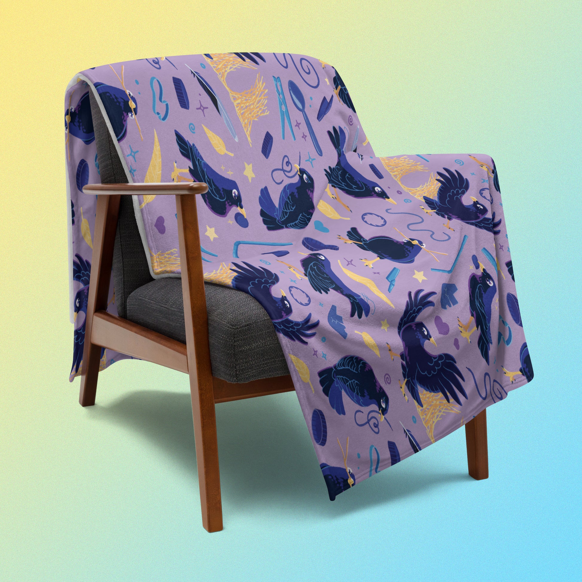A purple, blue and yellow male Aussie satin bowerbird pattern blanket draped over a wooden chair on a yellow and blue gradient background.