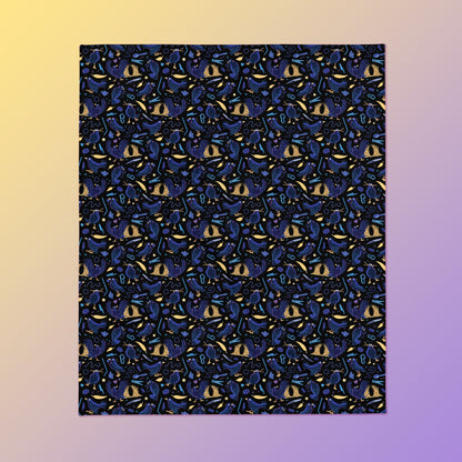 A black, blue, purple and yellow male Aussie satin bowerbird pattern blanket on a yellow and purple gradient background.