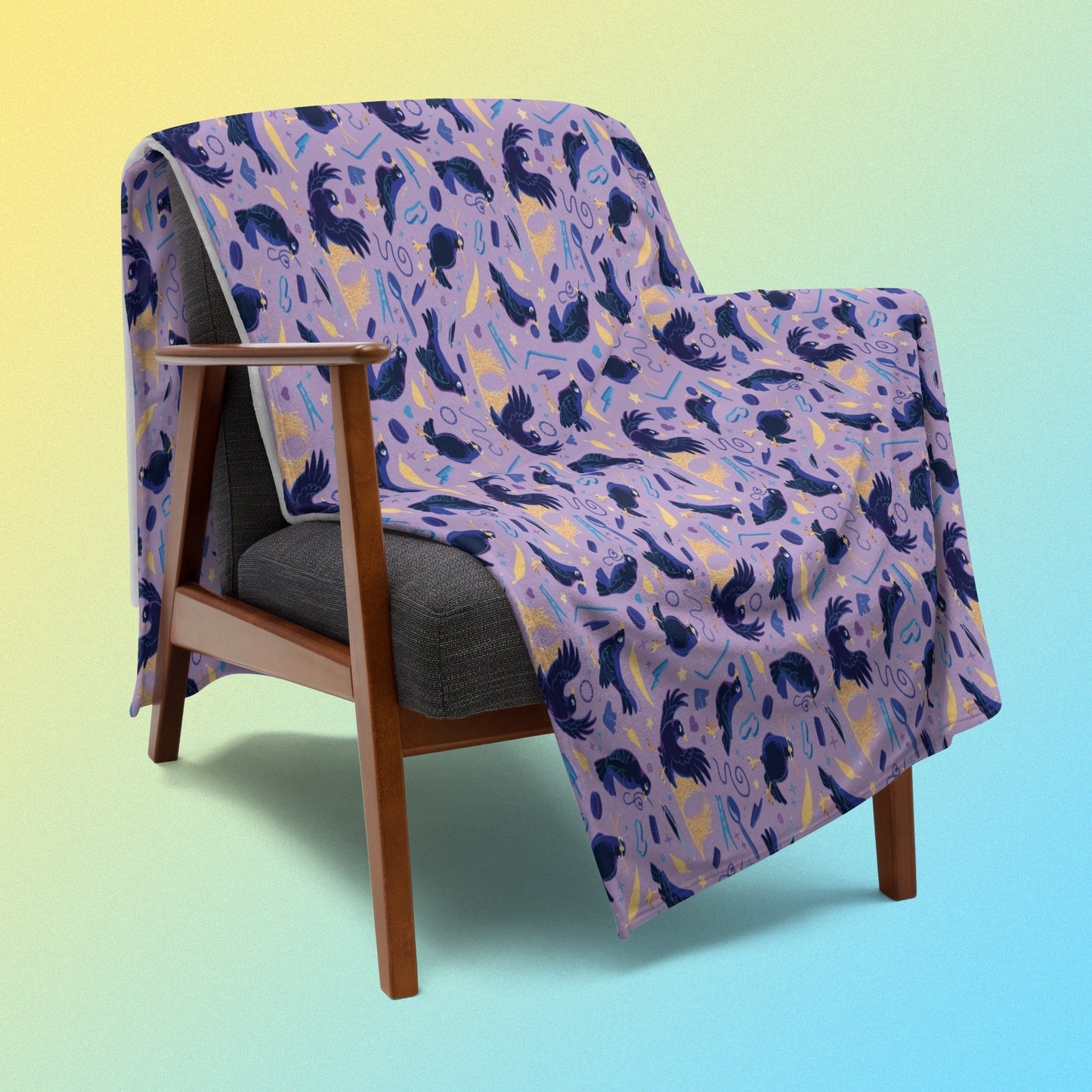 A purple, blue and yellow male Aussie satin bowerbird pattern blanket draped over a wooden chair on a yellow and blue gradient background.