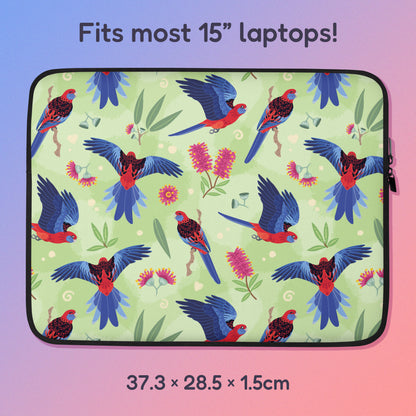 37.3 x 28.5 x 1.5cm 15" laptop sleeve with a colourful green, red, blue and pink crimson rosella pattern on a pink and blue gradient background.
