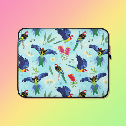 Laptop sleeve with a colourful rainbow, blue, green, red and pink Eastern Rosella pattern on a pink, yellow and green gradient background.
