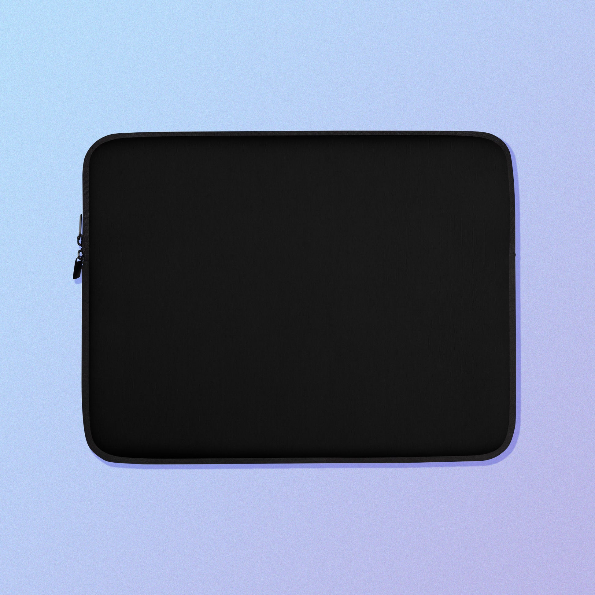 Laptop sleeve with plain black fabric on one side and a colourful rainbow kangaroo paw flower pattern on the other on a blue and purple gradient background.