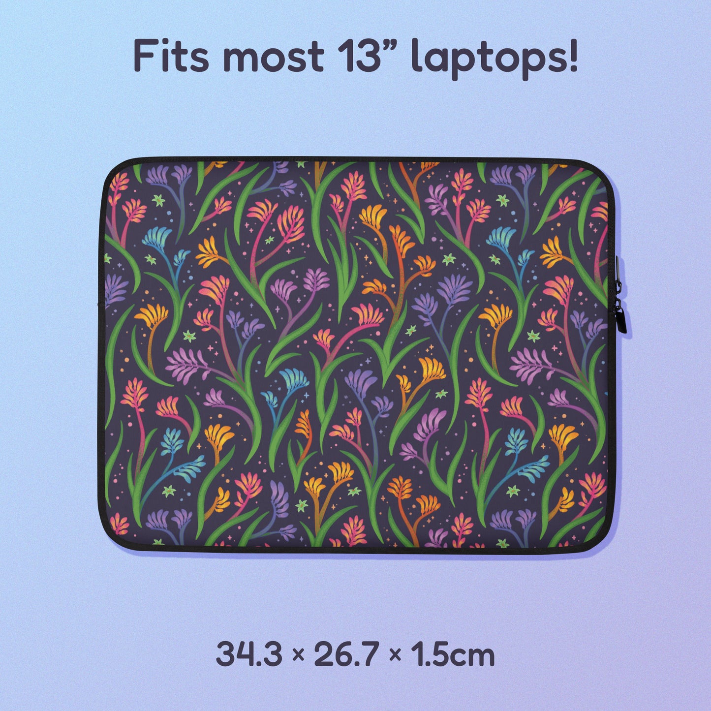 34.3 x 26.7 x 1.5cm 13" laptop sleeve with a colourful rainbow kangaroo paw flower pattern on a blue and purple gradient background.