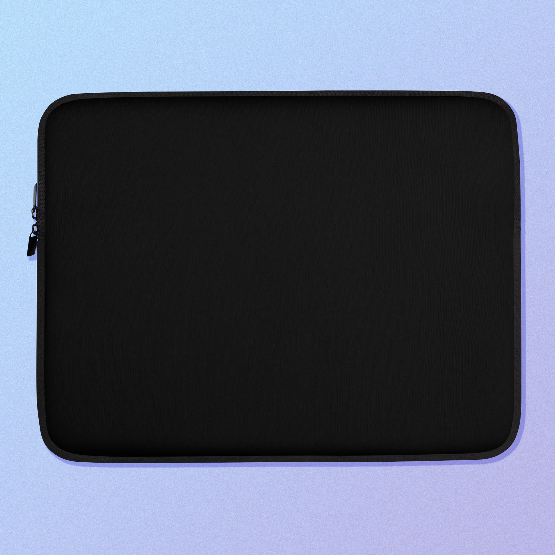 Laptop sleeve with plain black fabric on one side and a colourful rainbow kangaroo paw flower pattern on the other on a blue and purple gradient background.