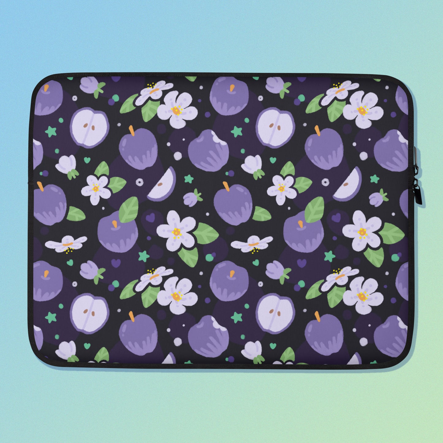 Laptop sleeve with a colourful purple apples and apple blossoms pattern on a blue and green gradient background.