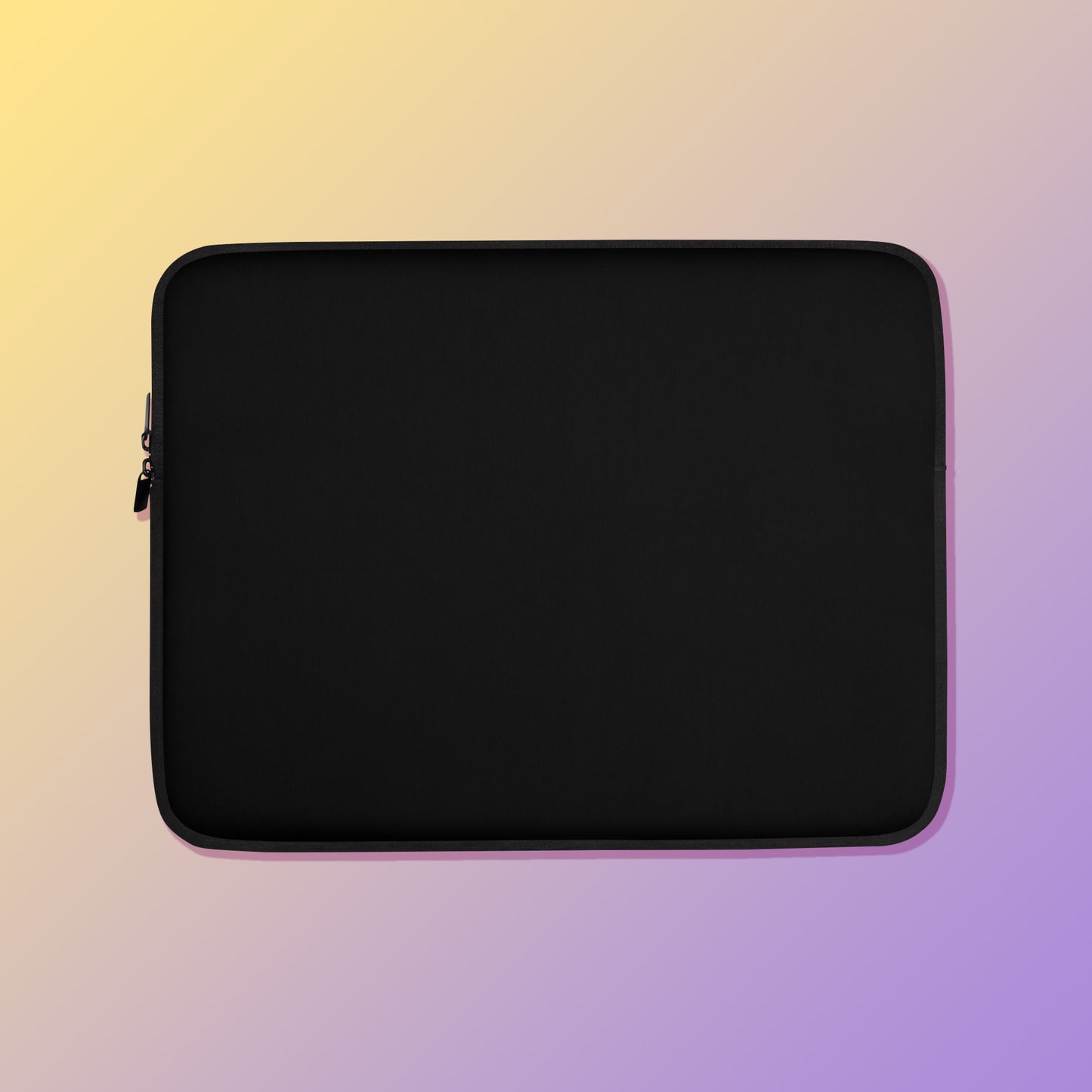 Laptop sleeve with a plain black colour on one side and a colourful purple, blue and yellow satin bowerbird pattern on the other on a yellow and purple gradient background.