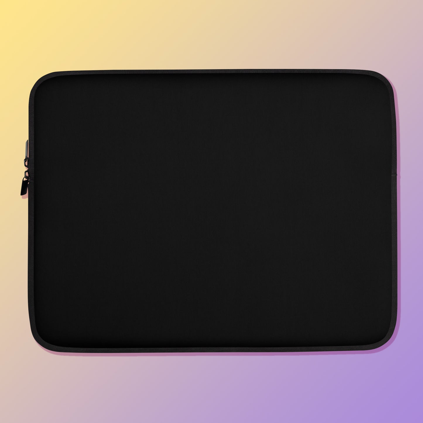 Laptop sleeve with a plain black colour on one side and a colourful purple, blue and yellow satin bowerbird pattern on the other on a yellow and purple gradient background.