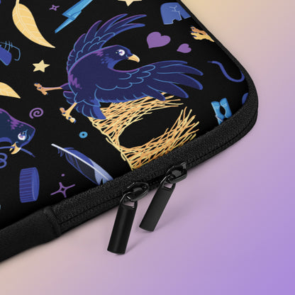 Close up detail of a laptop sleeve with a colourful purple, blue and yellow satin bowerbird pattern on a yellow and purple gradient background.