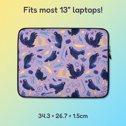 34.3 x 26.7 x 1.5cm 13" laptop sleeve with a colourful purple, blue and yellow satin bowerbird pattern on a yellow and blue gradient background.