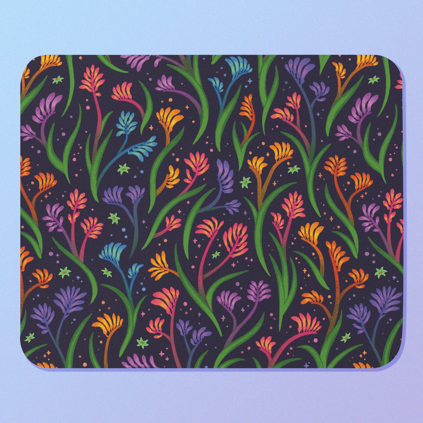 Colourful floral kangaroo paw themed mouse pad on a light blue background