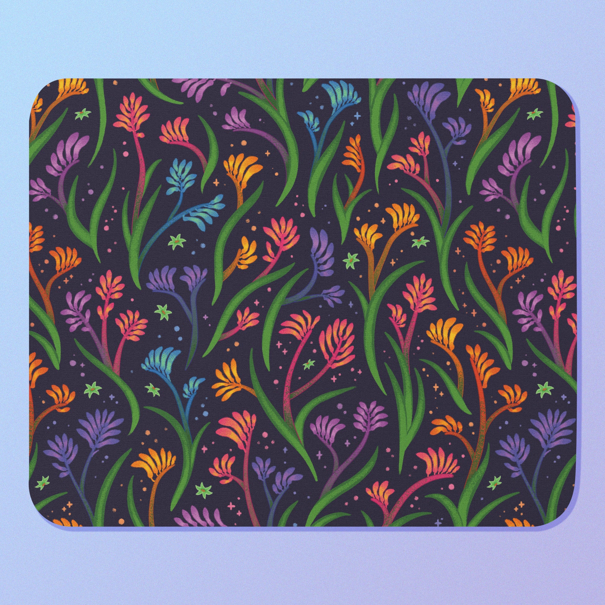 Colourful floral kangaroo paw themed mouse pad on a light blue background