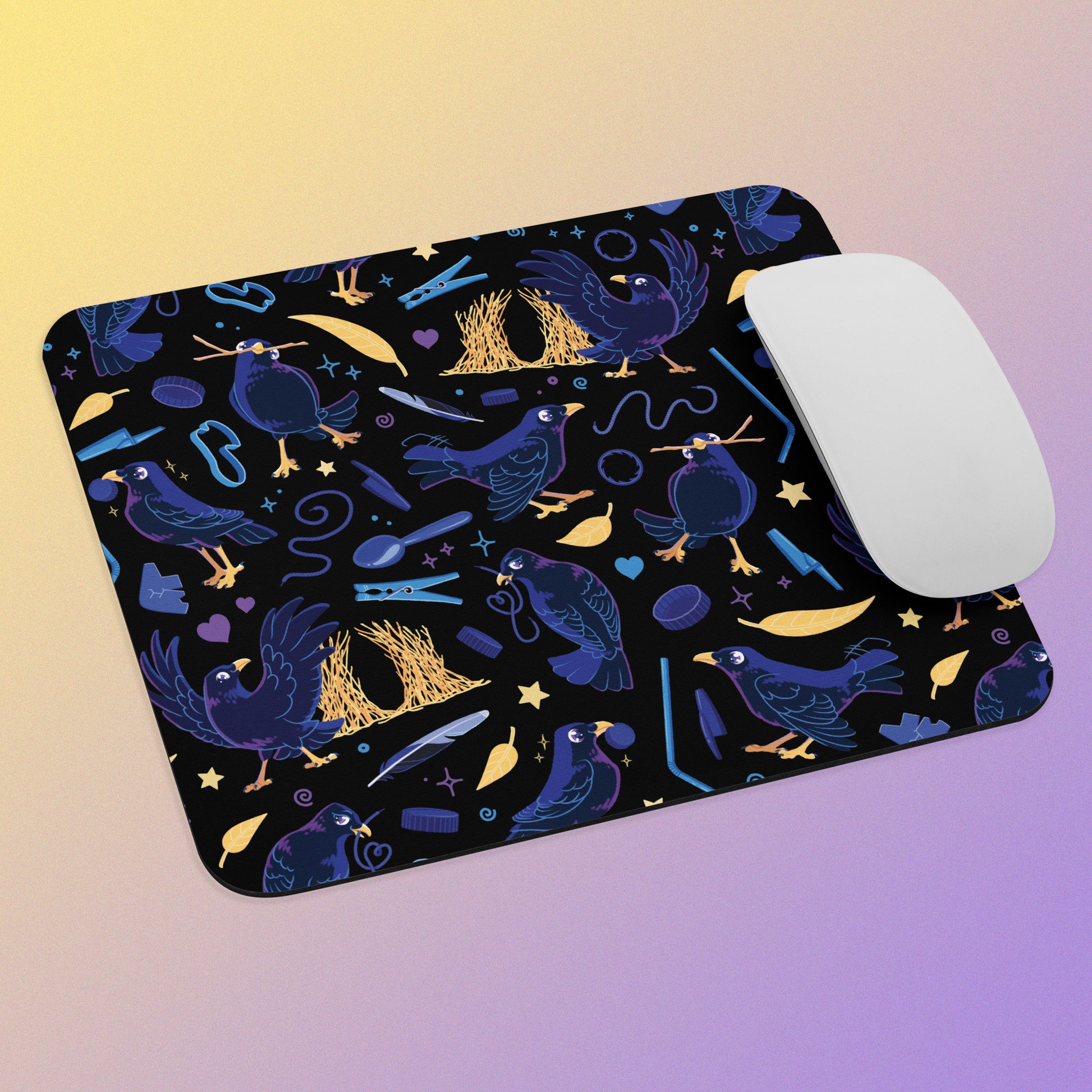 Dark blue-black mouse pad with a colourful satin bowerbird pattern and a white mouse on a gradient background