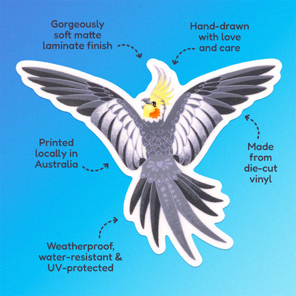 Features & benefits ('Hand-drawn with love and care', 'Made from die-cut vinyl', 'Gorgeously soft matte laminate finish', 'Weatherproof, water-resistant and UV-protected', 'Printed locally in Australia' surrounding a colourful sticker of a male wild-type cockatiel spreading his wings wide on a blue and aqua gradient background.