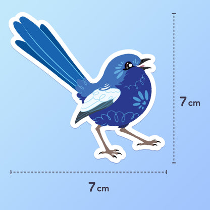 7x7cm colourful sticker of a male White-winged Fairywren chirping on a blue and cyan gradient background.