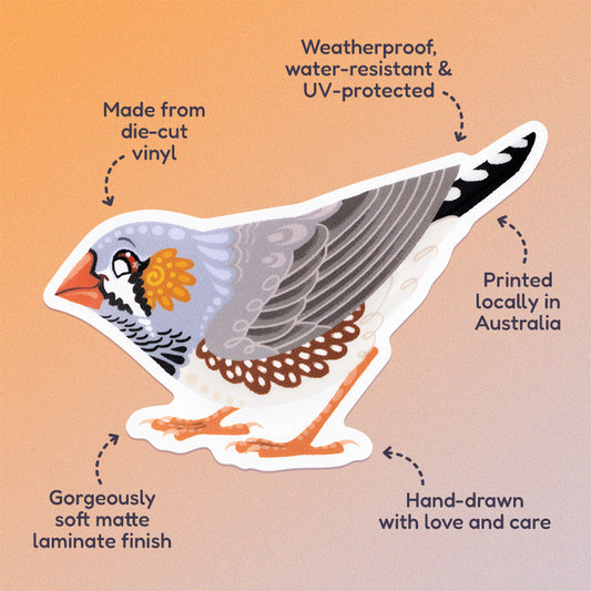Features & benefits ('Hand-drawn with love and care', 'Made from die-cut vinyl', 'Gorgeously soft matte laminate finish', 'Weatherproof, water-resistant and UV-protected', 'Printed locally in Australia' surrounding a colourful die-cut sticker of a male Australian zebra finch on a soft orange and beige gradient background.