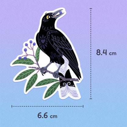 6.6x8.4cm colourful diecut sticker of a pied currawong eating a blueberry ash berry on a purple to blue gradient background.