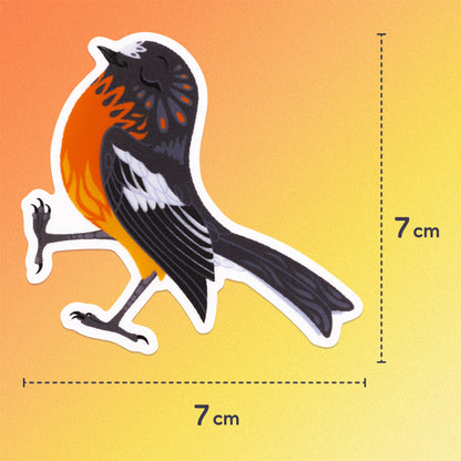 7x7cm colourful sticker of a male flame robin walking with pep in his step on an orange and yellow gradient background.