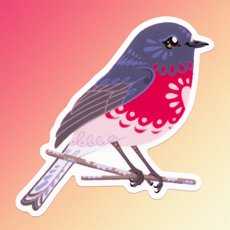 Colourful sticker of a male rose robin perched on a lichen-covered branch on a pink, coral and cream gradient background.