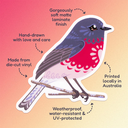 Features & benefits ('Hand-drawn with love and care', 'Made from die-cut vinyl', 'Gorgeously soft matte laminate finish', 'Weatherproof, water-resistant and UV-protected', 'Printed locally in Australia' surrounding a colourful sticker of a male rose robin perched on a lichen-covered branch on a pink, coral and cream gradient background.