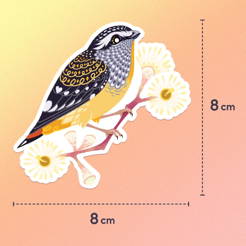 8 x 8cm colourful sticker of a spotted pardalote on a pink gum branch with pale yellow flowers on a yellow, orange and pink gradient background.
