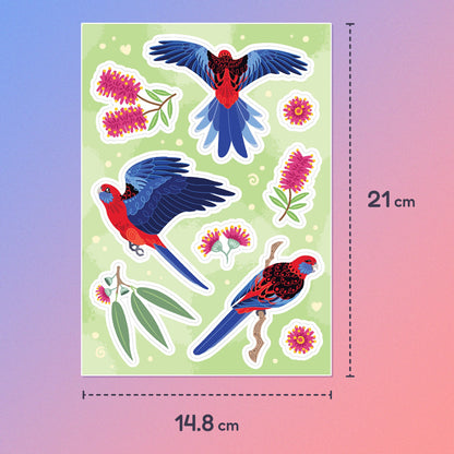 A5 (21 x 14.8cm) colourful sticker sheet of 3 different Crimson Rosellas, eucalyptus leaves, eucalyptus flowers and pink bottlebrush flowers on a blue and pink gradient background.