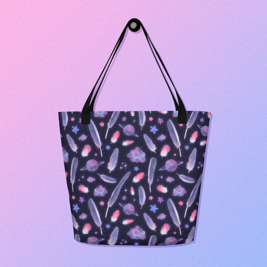 Tote bag with a black strap and galah cockatoo feather and galaxy-themed pattern on a gradient purple background