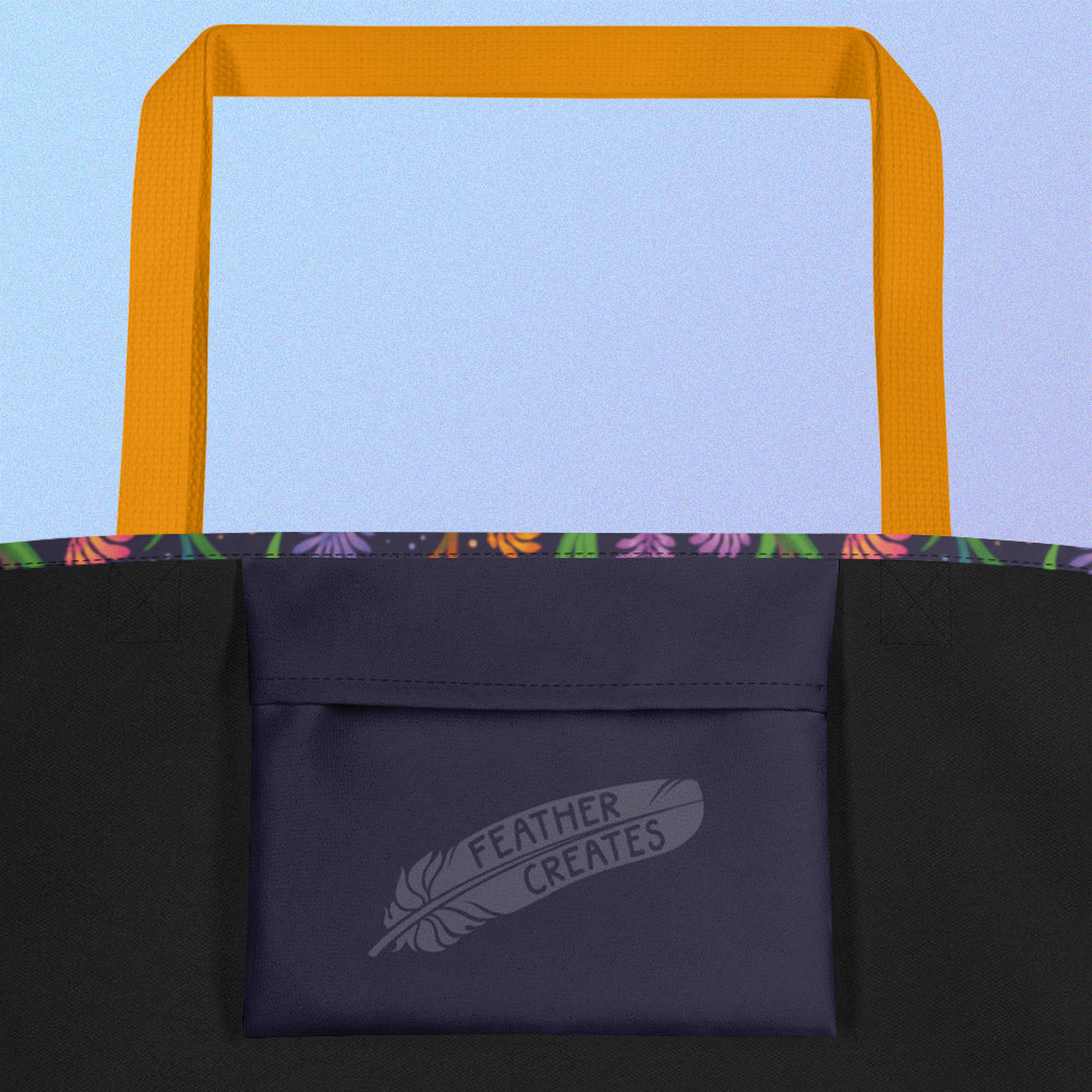 Close up of a dark purple fold-over pocket on the inside of a tote bag with a yellow strap on a gradient blue and purple background.