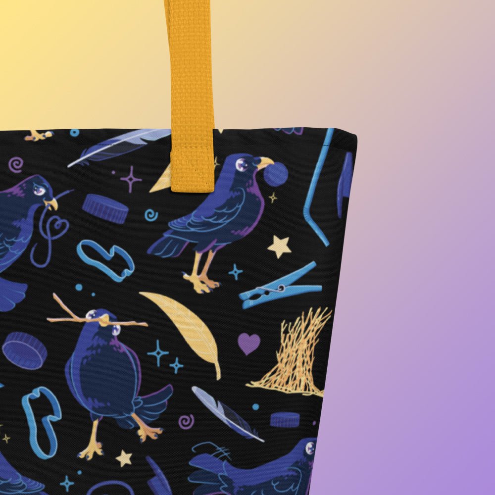 Close up of a tote bag with yellow handles and a black/blue/yellow satin bowerbird pattern pattern on a yellow and purple gradient background.
