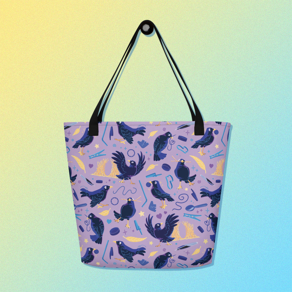 Tote bag with black handles and a purple/blue/yellow satin bowerbird pattern on a yellow and blue gradient background.