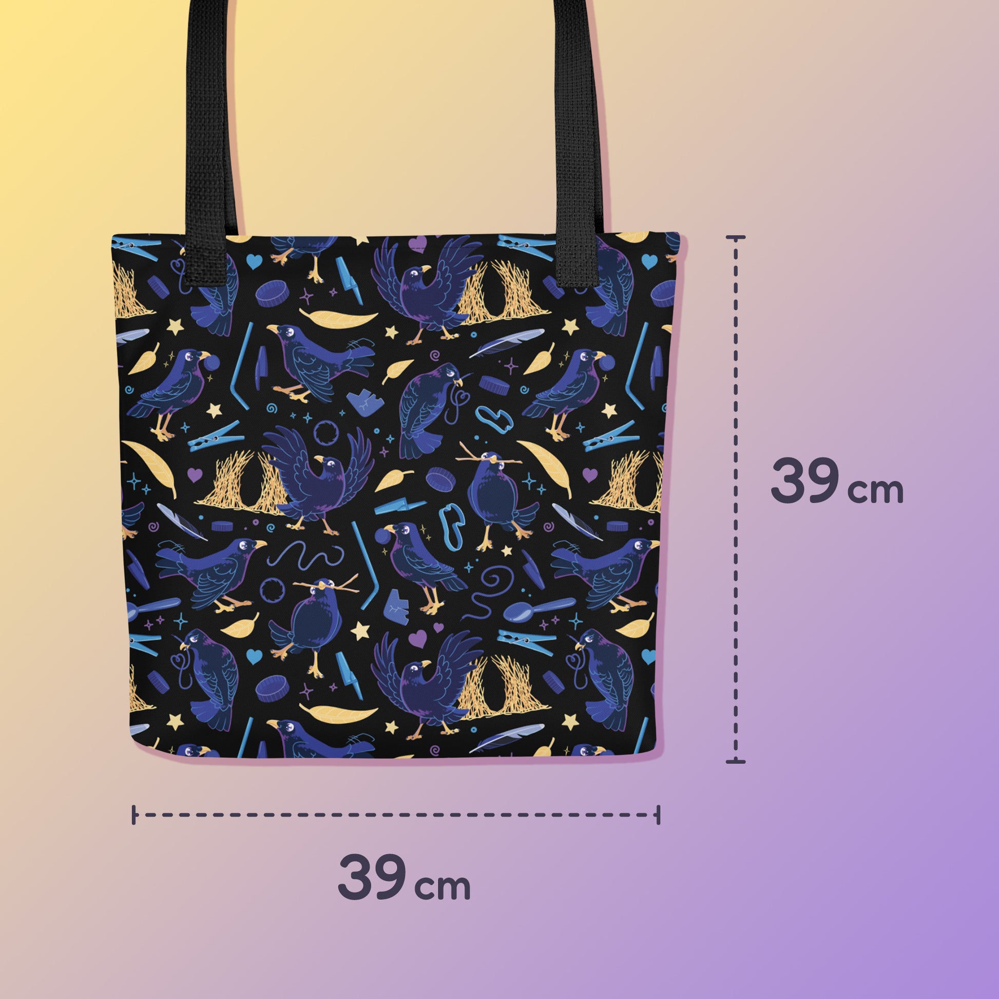 39 x 39cm tote bag with black handles and a black/blue/yellow satin bowerbird pattern pattern on a yellow and purple gradient background